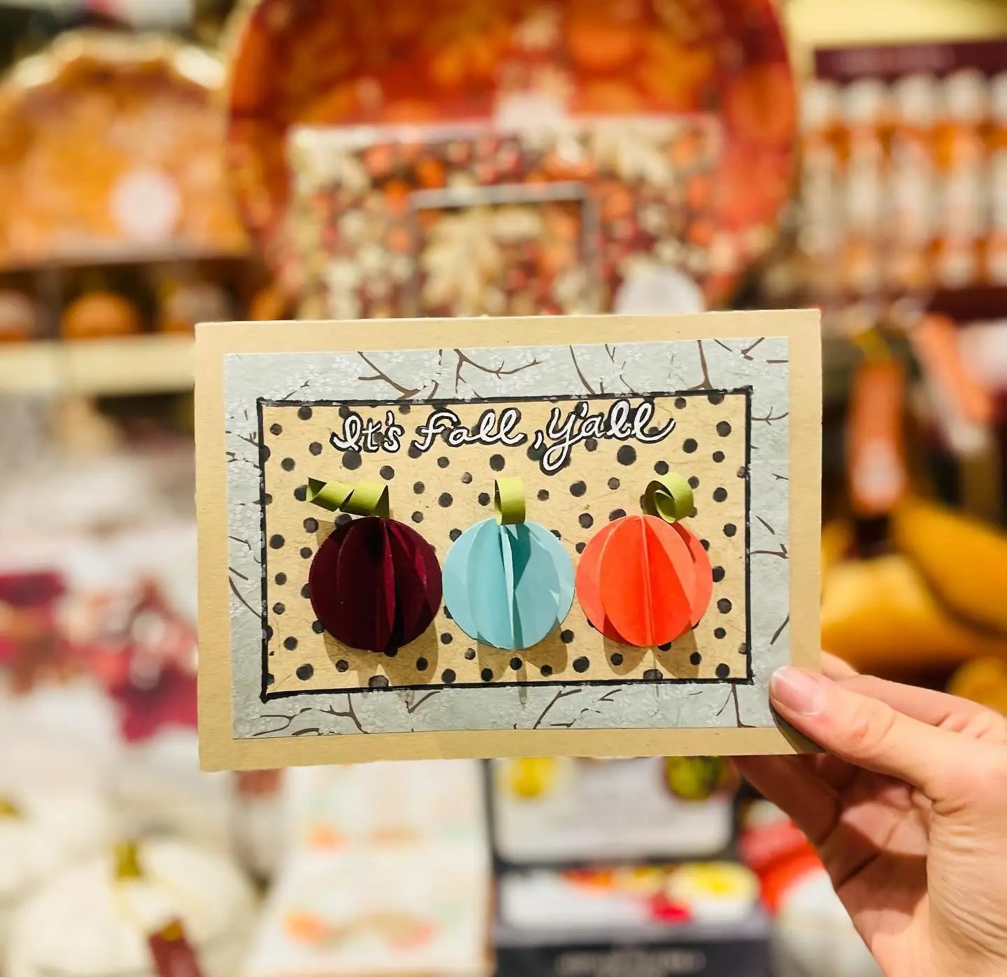 Cute handmade fall-themed card with mini pumpkins that reads, It's Fall Y'all.