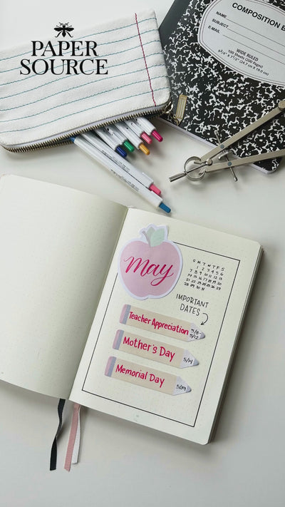 DIY video entailing a creative way to make a planner cover page for May.