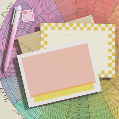 Colorful personalized stationery rotating through different customizable colorways.