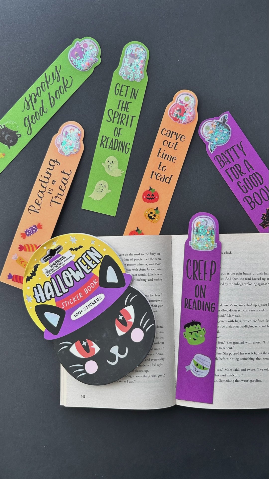 Video detailing how to create Halloween sticker bookmarks.
