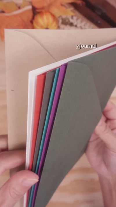 Video displaying a creatively decorated envelope by yjournaling.