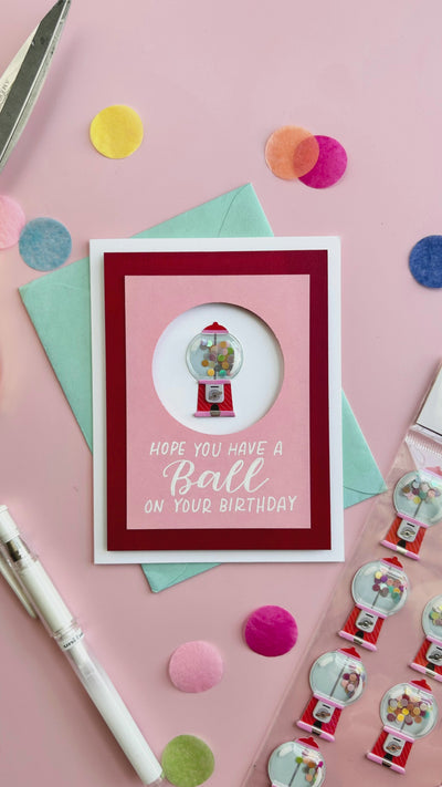 Video displaying how to use crafts to create a handmade Gumball Birthday Card.