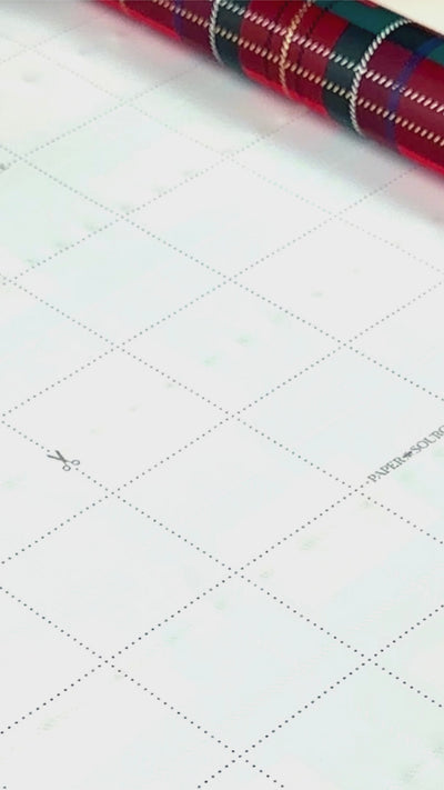 Stone paper video detailing the printed grid lines on the back of every roll.