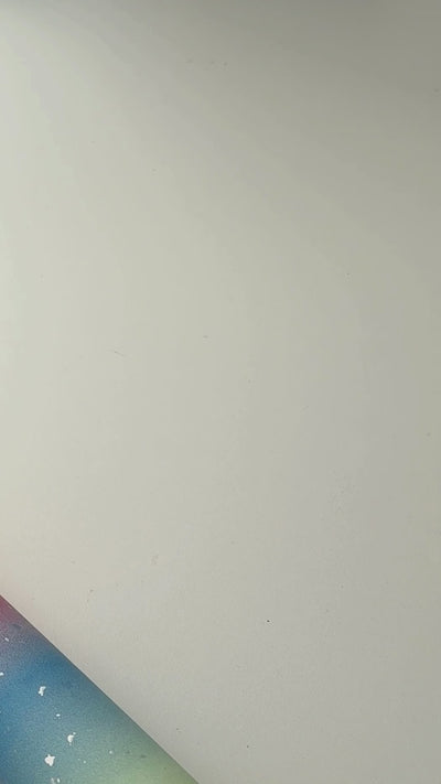 Stone paper video detailing the printed grid lines on the back of every roll.