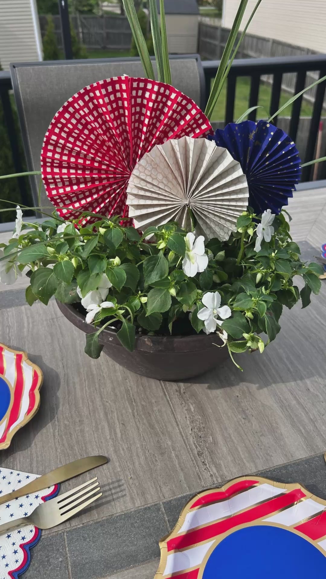 Video detailing how to create a DIY rosette centerpiece for outdoor celebrations.