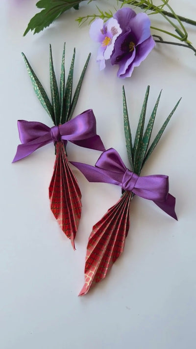 How-to video displaying how to DIY fine paper carrots.