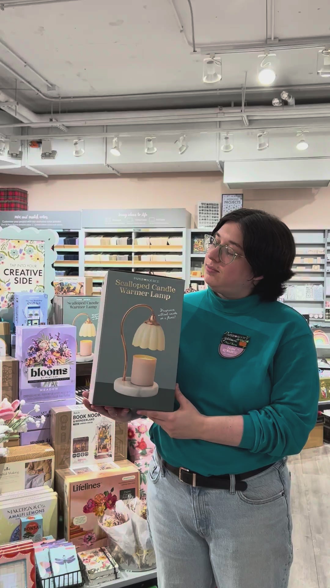 Video of Paper Source staff showing the Scalloped Candle Warmer Lamp.