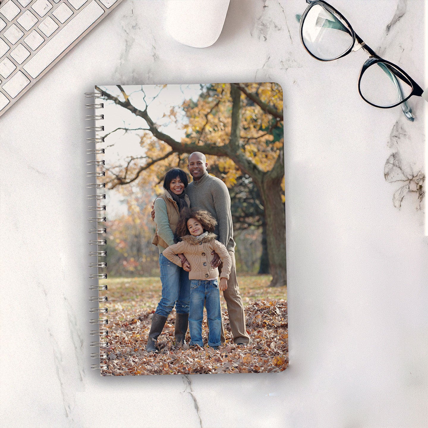 Journal with custom photograph of a family on the cover.