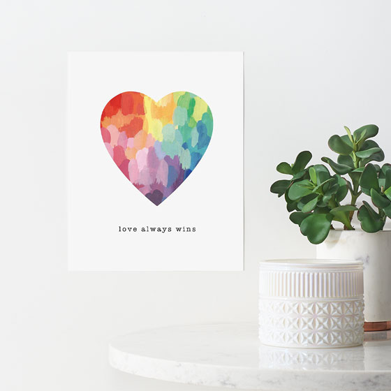 Beautiful art print of a rainbow heart that reads, Love always Wins. Designed by Paper Source.