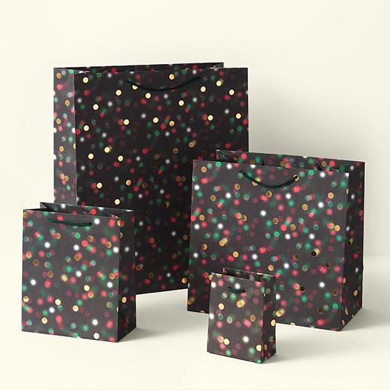 Black gift bags with colorful twinkle lights design.